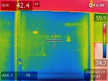 Low thermal resistance of a window suggesting energy inefficiency.